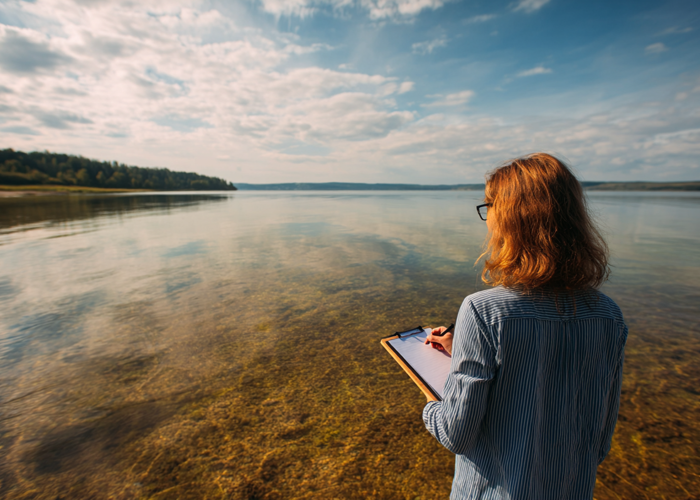 Shoutdigital A Woman With A Clipboard Looking At A Body Of Wa 3704D0bb Ed4b 4D30 9814 16Eba848c171 3